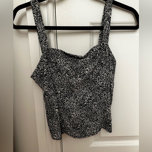 Black and white dynamite tank top. Loose fitted. Great condition. Only worn once - Picture 1 of 3